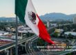 Bandera de México ondeando sobre Ciudad de México, representando a los opositores y funcionarios españoles que trabajan o se presentan a procesos selectivos desde México.
